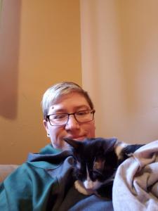 Bishop appreciates having a warm human to snuggle with.